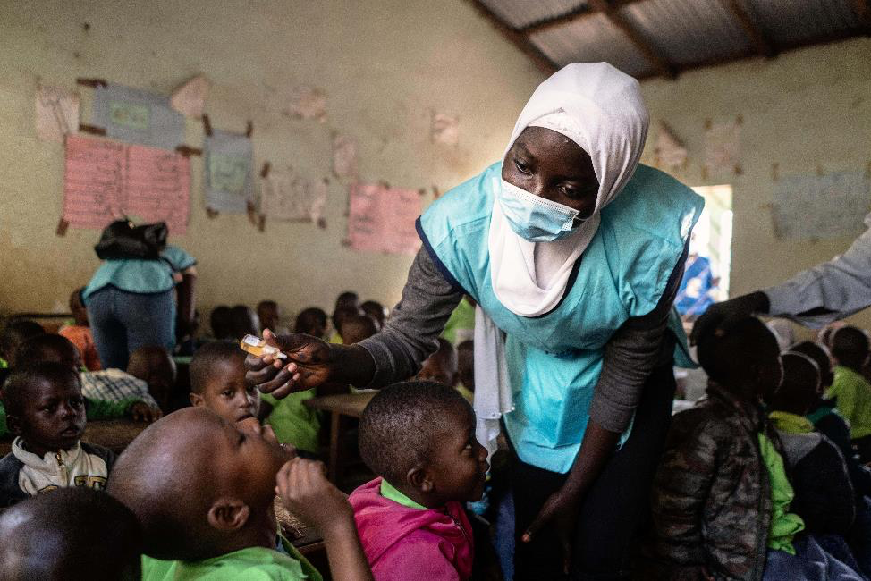 A local musician in The Gambia builds trust in the polio vaccine with the rhythm of his drums 4