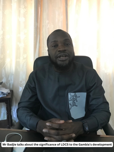 Lawmaker for Banjul North helps to pump the flood water out of the compound 2