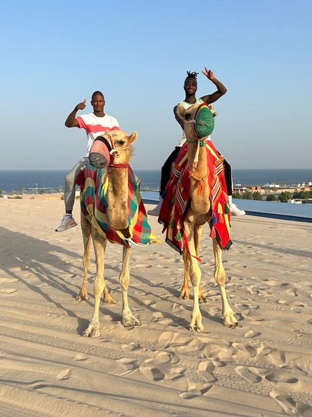 Tijan and Yusupha take a camel ride after succesfully sealing transfer deal