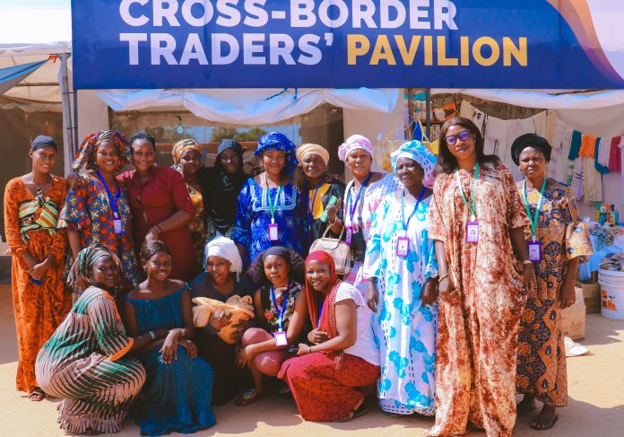 Women cross-border traders pose for a photo at the National Yout