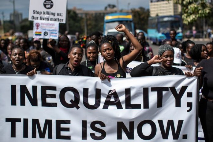 Demonstrators against inequality march to the office of the president in downtown Nairobi, Kenya
