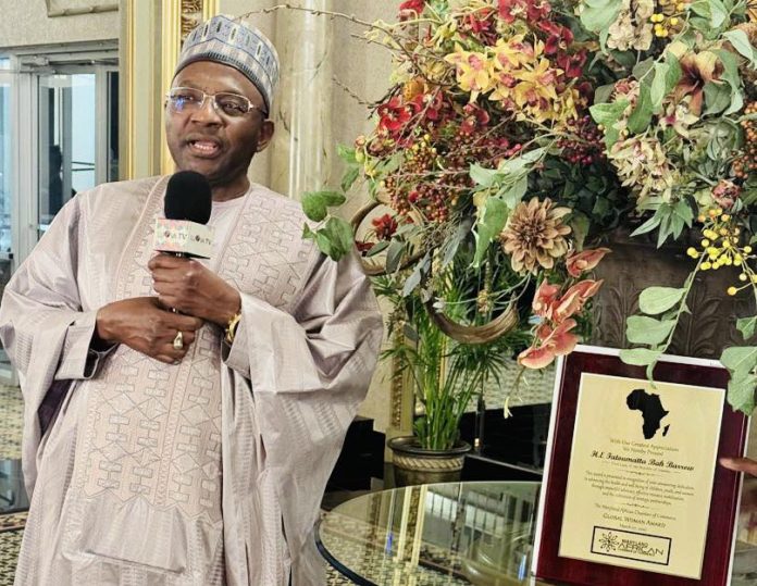 Ambassador Bah receives the Award on behalf of Her Excellency
